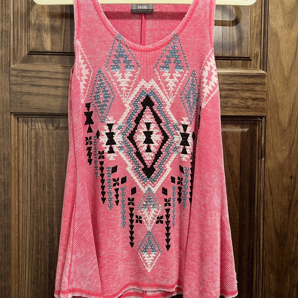 Vocal tank top size L. Coral color.